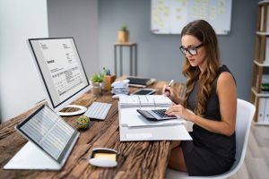 Business woman working on her accounts.